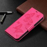 Peňaženkové kožené puzdro Embossing Two Butterflies na Motorola G14 - Rose Red