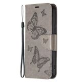 Peňaženkové kožené puzdro Embossing Two Butterflies na Motorola G14 - Sivá